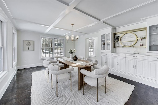 dining area featuring coffered ceiling, a wealth of natural light, and baseboards