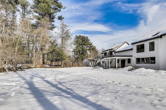 view of yard covered in snow