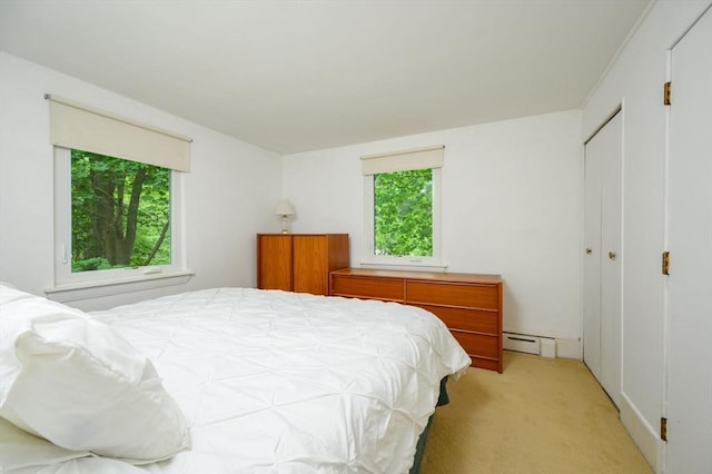 13 Smith Rd, Hingham, MA 02043 - bedroom featuring a baseboard radiator, light carpet, and a closet