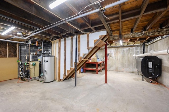 13 Smith Rd, Hingham, MA 02043 - unfinished basement with oil tank, water heater, and stairway