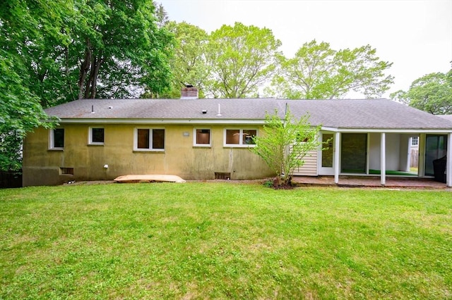 13 Smith Rd, Hingham, MA 02043 - back of property featuring a chimney, a patio area, a yard, and a shingled roof