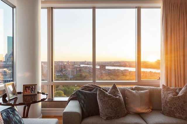living area with a view of city and a water view