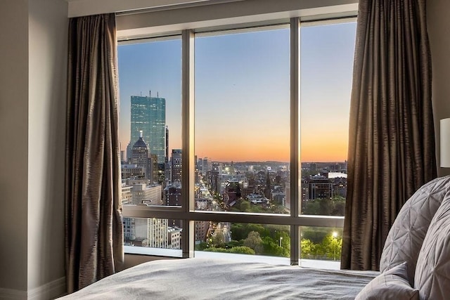 bedroom featuring a view of city