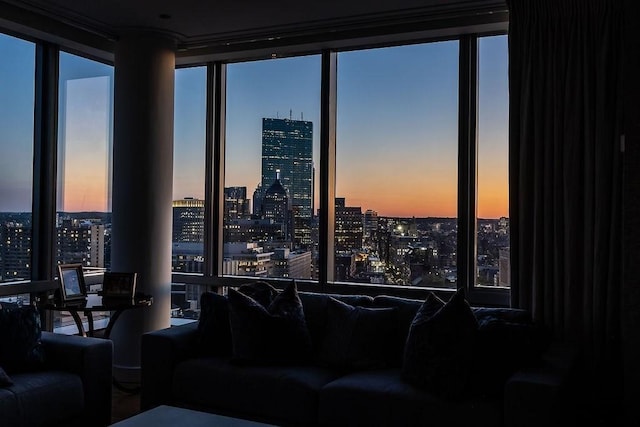 living room with a view of city and floor to ceiling windows