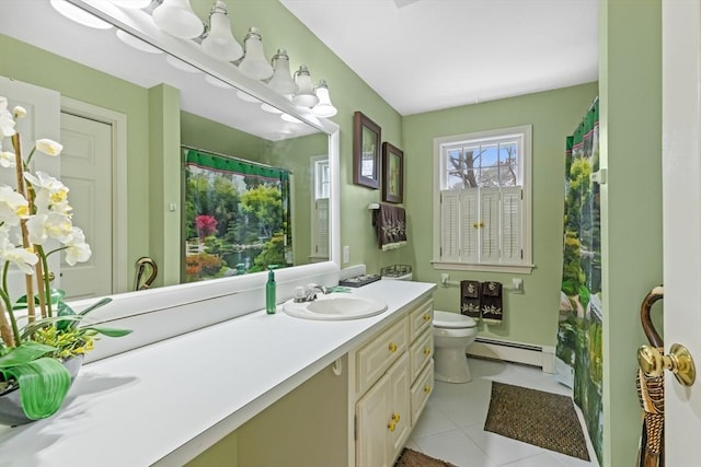 bathroom with toilet, tile patterned floors, a baseboard radiator, and vanity