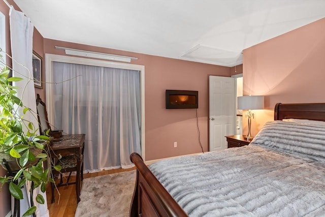 bedroom with light wood-type flooring