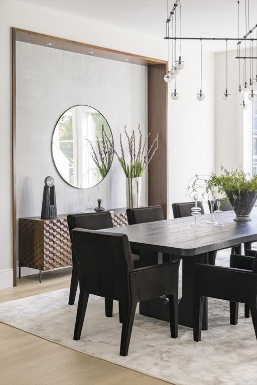 dining area featuring light wood-type flooring