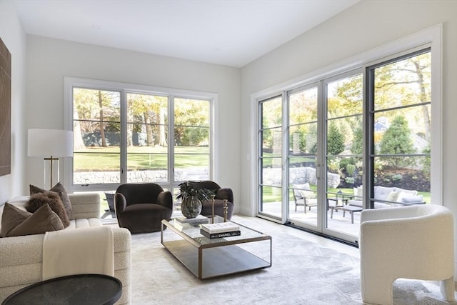 living room featuring french doors and light carpet