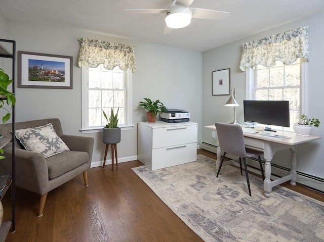 office space with ceiling fan, baseboards, and wood finished floors