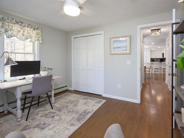 office with a ceiling fan, baseboards, and wood finished floors