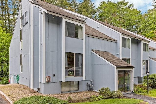 374 Great Rd Unit 10, Acton, MA 01720 - view of property exterior with a shingled roof