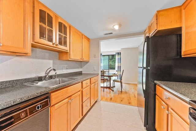 374 Great Rd Unit 10, Acton, MA 01720 - kitchen with dishwasher, a sink, glass insert cabinets, dark countertops, and backsplash