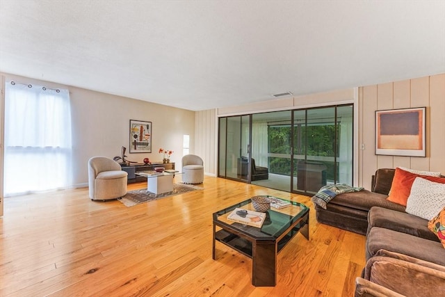 374 Great Rd Unit 10, Acton, MA 01720 - living room with light wood-style floors and healthy amount of natural light