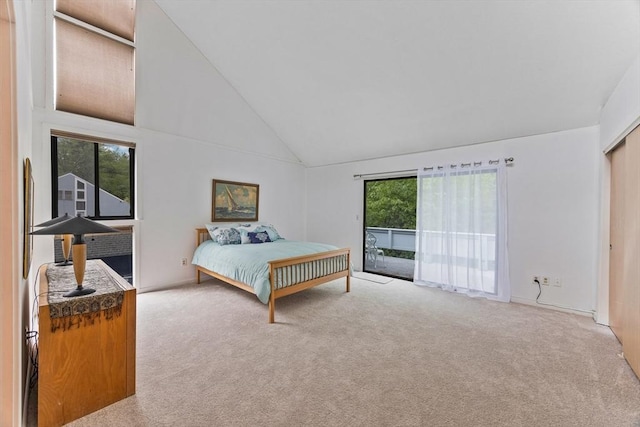 374 Great Rd Unit 10, Acton, MA 01720 - carpeted bedroom featuring access to outside and high vaulted ceiling