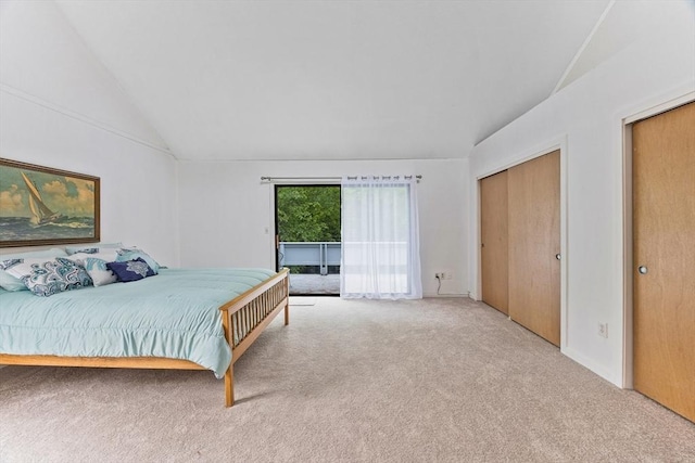 374 Great Rd Unit 10, Acton, MA 01720 - carpeted bedroom with vaulted ceiling and access to exterior