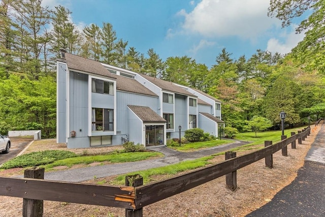 374 Great Rd Unit 10, Acton, MA 01720 - view of front of home featuring a shingled roof