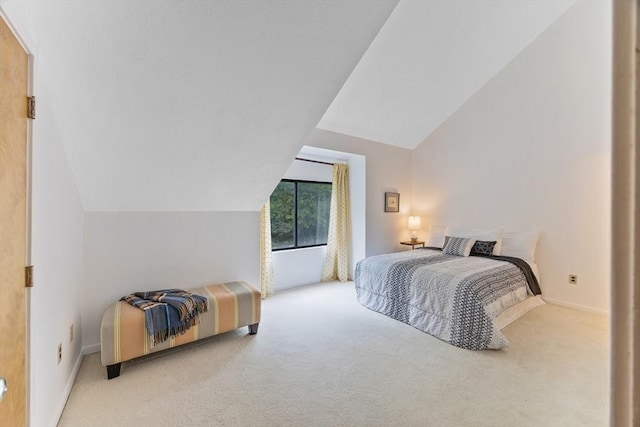 374 Great Rd Unit 10, Acton, MA 01720 - carpeted bedroom with lofted ceiling and baseboards