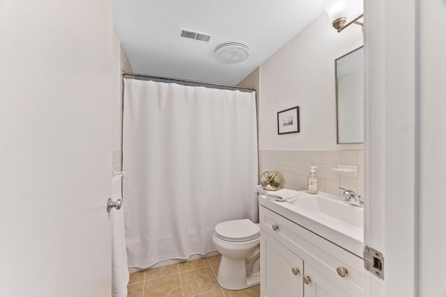 374 Great Rd Unit 10, Acton, MA 01720 - full bath featuring vanity, toilet, tile patterned flooring, and a shower with shower curtain