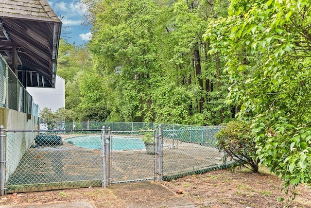374 Great Rd Unit 10, Acton, MA 01720 - view of swimming pool with a gate