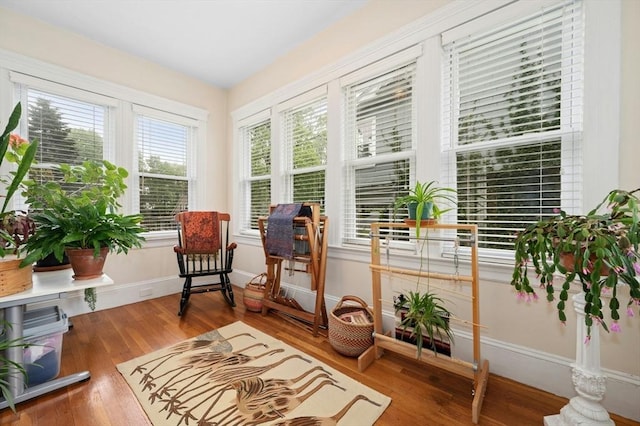 sitting room featuring wood finished floors and baseboards