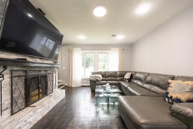 109 Circle Dr, Wrentham, MA 02093 - living room featuring wood finished floors, a baseboard heating unit, and a stone fireplace