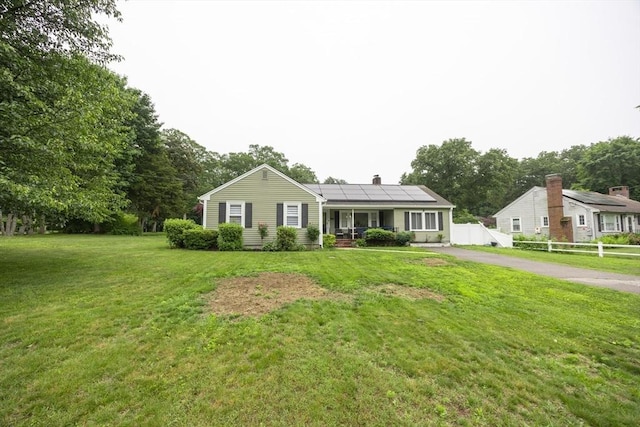 109 Circle Dr, Wrentham, MA 02093 - single story home featuring solar panels, a chimney, and driveway