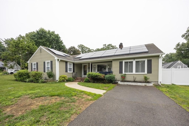 109 Circle Dr, Wrentham, MA 02093 - ranch-style home with covered porch, roof mounted solar panels, and driveway