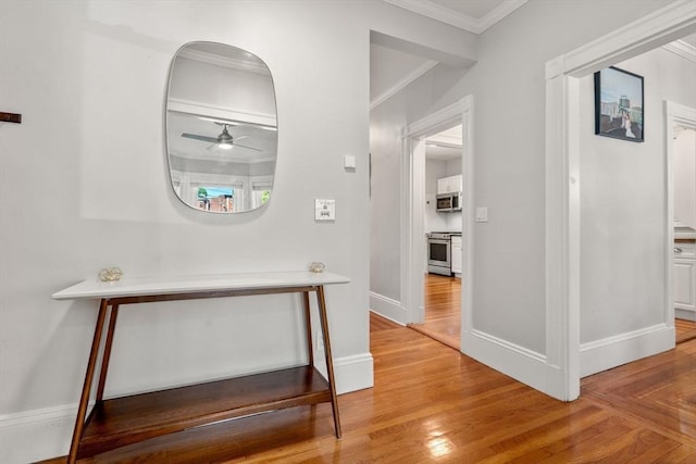 17 Park Vale Unit 2, Brookline, MA 02446 - hall with crown molding, wood finished floors, and baseboards