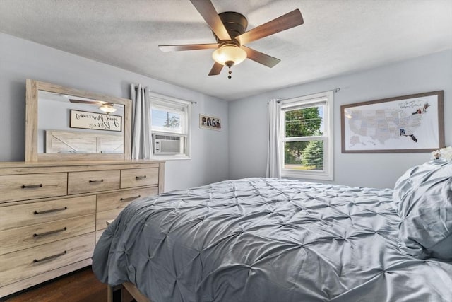 36 Porter Rd, Marlborough, MA 01752 - bedroom with a ceiling fan, a textured ceiling, and cooling unit