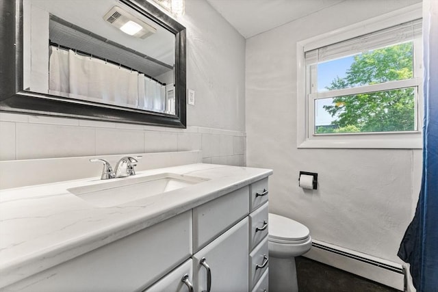 36 Porter Rd, Marlborough, MA 01752 - bathroom featuring a baseboard radiator, vanity, tile walls, and a shower with shower curtain