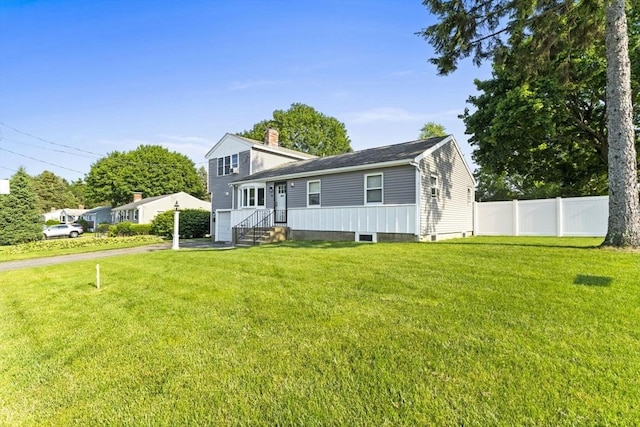 36 Porter Rd, Marlborough, MA 01752 - view of front facade featuring driveway and a chimney