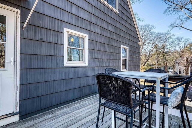 deck with outdoor dining space