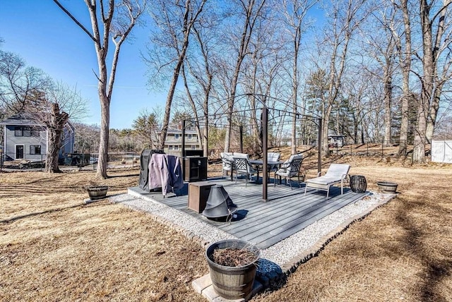 view of yard featuring a wooden deck