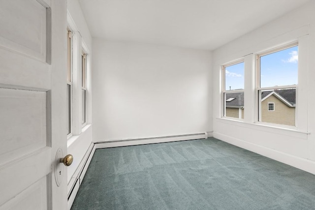 67-69 Nesmith St, Lawrence, MA 01841 - carpeted spare room with a baseboard radiator and baseboards