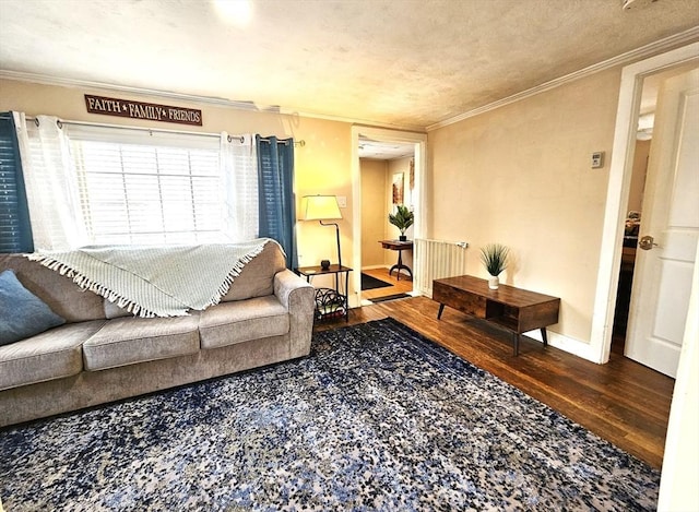 living room featuring ornamental molding and wood-type flooring