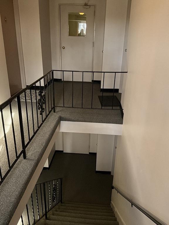 stairway with baseboards