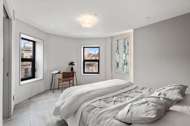 bedroom with concrete flooring