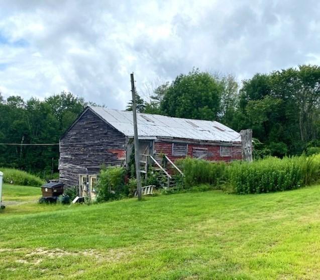 45 Gardner Rd, Hubbardston, MA 01452 - back of house featuring a yard and an outbuilding