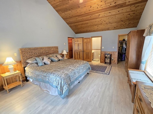 6 Nevada, Freetown, MA 02702 - bedroom with light wood-type flooring, a walk in closet, a closet, wood ceiling, and a wainscoted wall