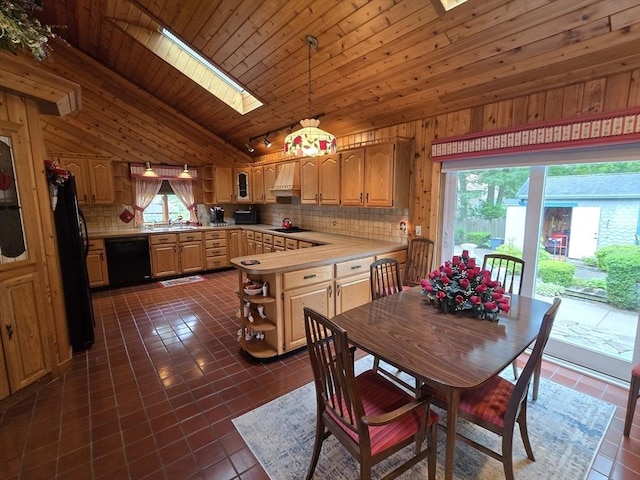 6 Nevada, Freetown, MA 02702 - dining room featuring a skylight, vaulted ceiling, dark tile patterned flooring, and wood ceiling