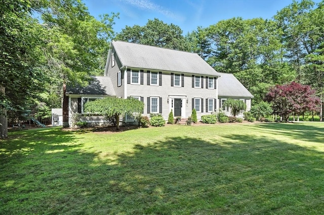134 Lincoln St, Norwell, MA 02061 - colonial-style house with a front yard, a playground, and roof with shingles