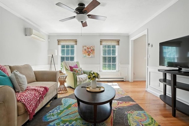 134 Lincoln St, Norwell, MA 02061 - living room featuring a wall mounted air conditioner, a ceiling fan, light wood finished floors, ornamental molding, and wainscoting