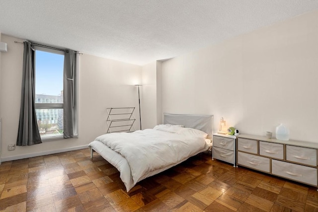 bedroom with a textured ceiling