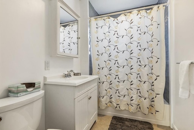 full bath featuring tile patterned floors, vanity, toilet, and shower / tub combo with curtain