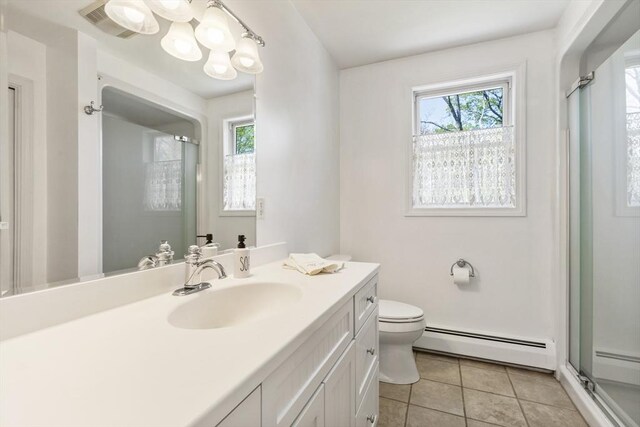 full bathroom with tile patterned flooring, vanity, toilet, a baseboard radiator, and a stall shower