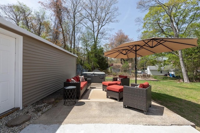 view of patio / terrace with a hot tub and an outdoor living space