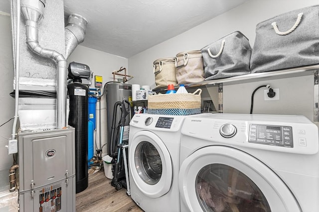 117 Woodland Dr, Lunenburg, MA 01462 - washroom featuring washer and clothes dryer and wood finished floors