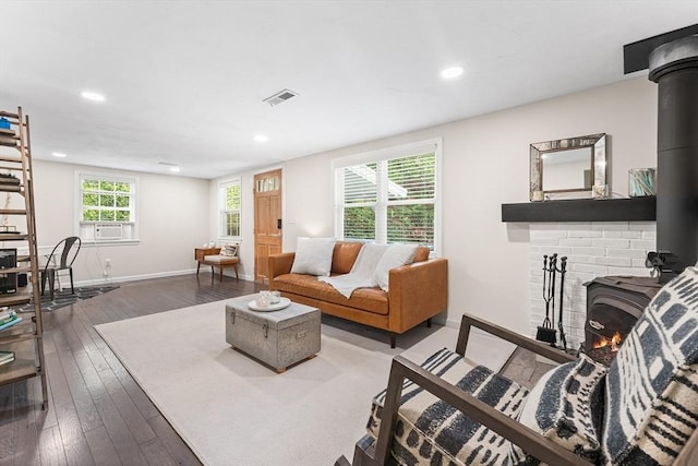 117 Woodland Dr, Lunenburg, MA 01462 - living room featuring a wood stove, hardwood / wood-style flooring, recessed lighting, and cooling unit
