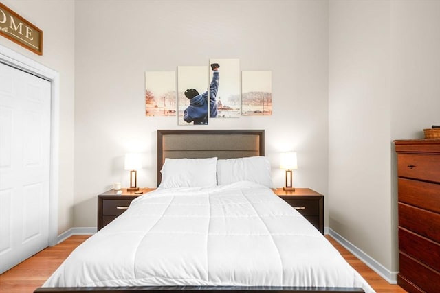 743 E 4th Unit 204, Boston, MA 02127 - bedroom featuring wood finished floors and baseboards
