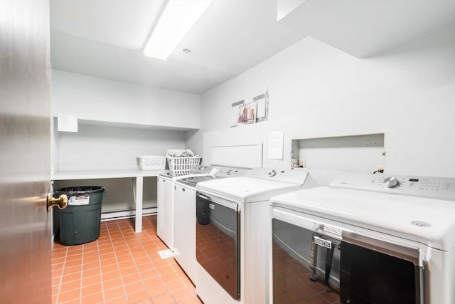 743 E 4th Unit 204, Boston, MA 02127 - laundry room with washing machine and clothes dryer, a baseboard radiator, and light tile patterned floors